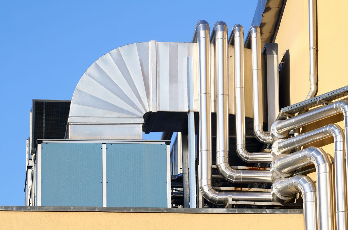 Rooftop ventilation ductwork Polished rooftop ductwork and piping on a commercial HVAC unit