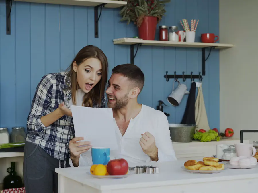 couple-getting-solar Homeowner couple reviewing solar savings at the kitchen counter
