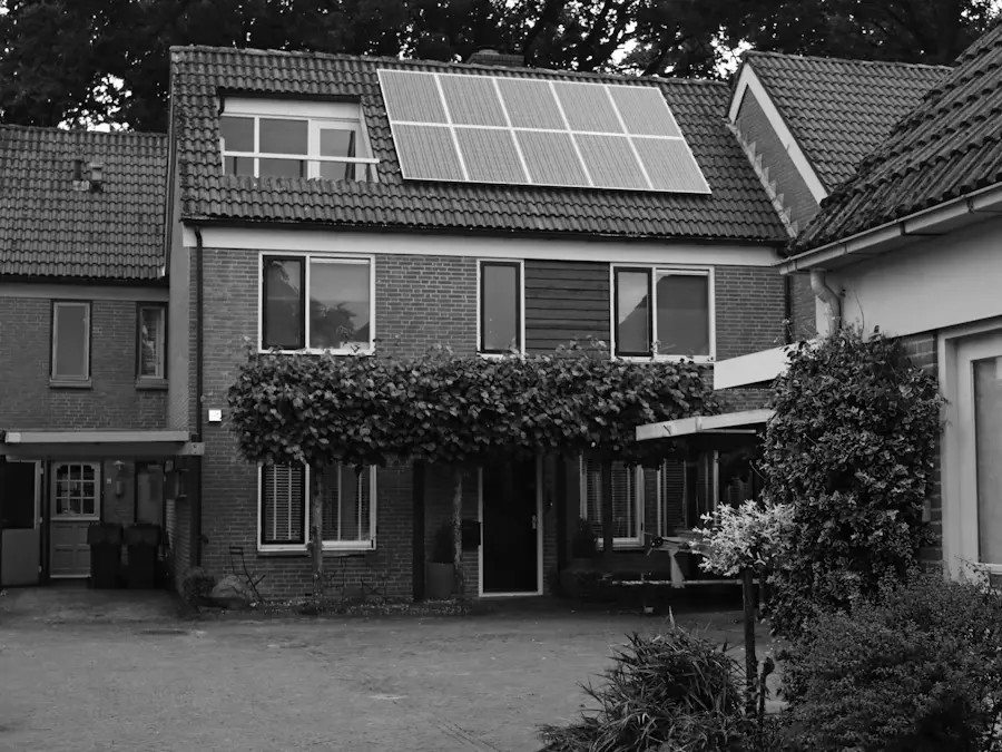 residential-soalr Brick home with rooftop solar panels